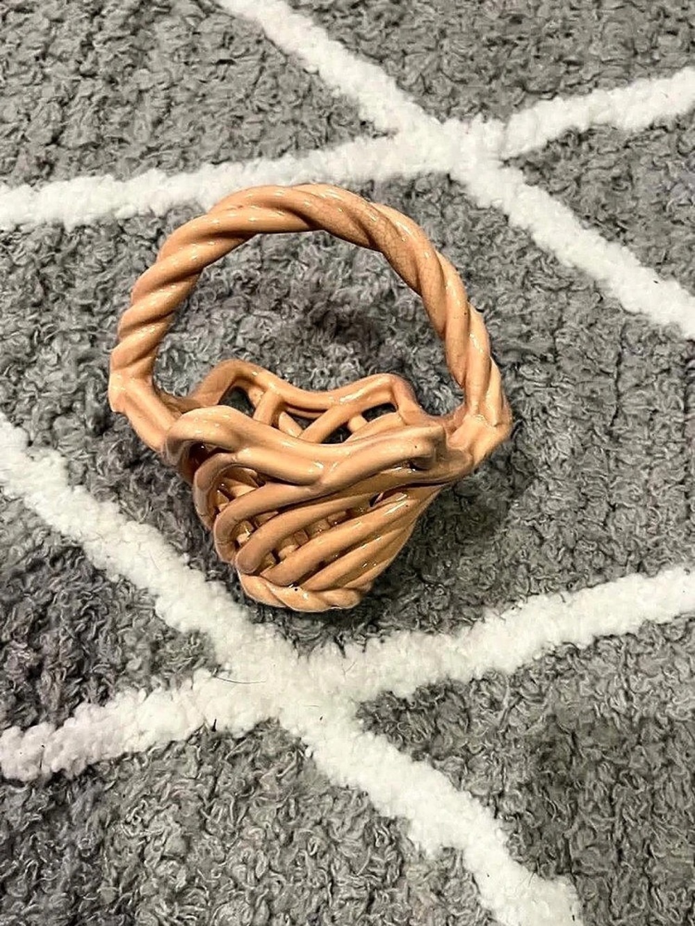 vintage peach-colored ceramic or porcelain woven basket